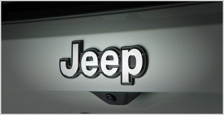 Jeep emblem bonded to vehicle with our emblem attachment solutions