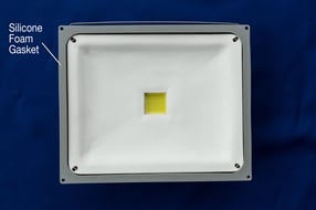 Outdoor lighting fixture with silicone foam gasket